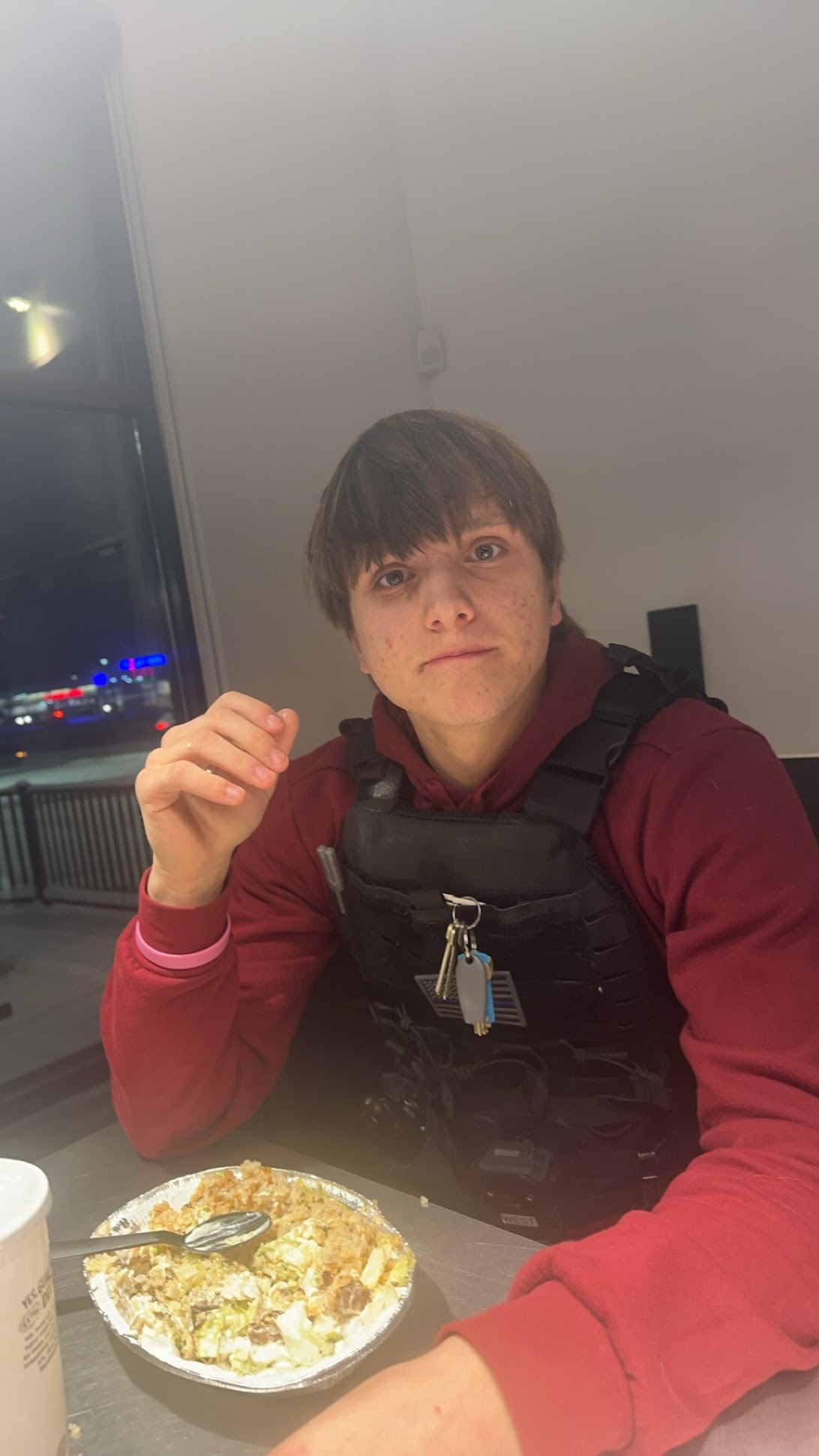 Zach eating in tactical vest